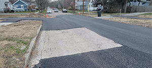 Temporary paving of Lyman Avenue prior to the winter shutdown after construction season 1.