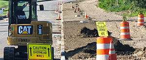 Topsoil placement in the green space between the shared use path and the Parkway between Flynn Avenue and Home Avenue.