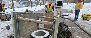 Sewer manhole installation along Lyman Avenue.
