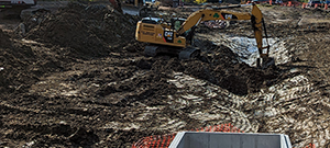 The Champlain Parkway included several stormwater features including the construction of a stormwater detention pond near Englesby Brook. Pictured installation of drainage pipe.