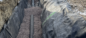 The installation of underdrain, a stormwater feature, beneath the new Champlain Parkway between Lakeside Avenue and Home Avenue.