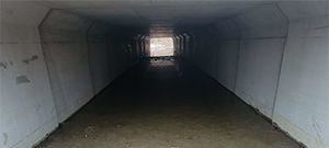 The Champlain Parkway Project includes several stormwater features including a box culvert for the Englesby Brook. Pictured completed upstream end of the box culvert with streambed material placed and water introduced.