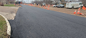 Temporary paving of Briggs Street prior to the winter shutdown after construction season 1.
