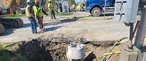 Installation of the foundation for the new railroad signal at the railroad crossing at Flynn Avenue.