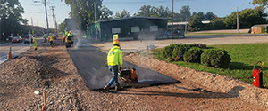Base paving the shared use path along Pine Street.