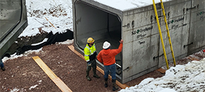 The Champlain Parkway Project includes several stormwater features including a box culvert for the Englesby Brook. Pictured placement of the precast box culvert segments.